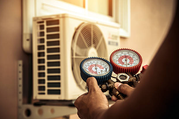 Professional Heat Pump Repair technician working in Pembroke, GA